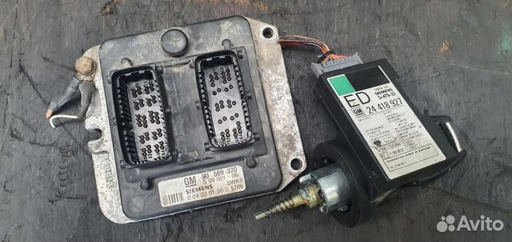 Эбу opel 90569370