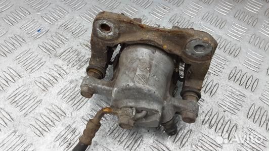 Суппорт тормозной задний правый toyota RAV 4 ZSA3