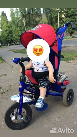 Трехколесный велосипед с ручкой