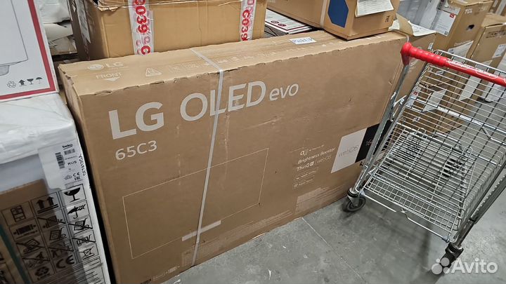 Новый на фото он телевизор lg oled65c3rla