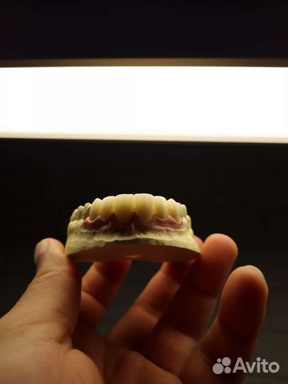 Зубной техник