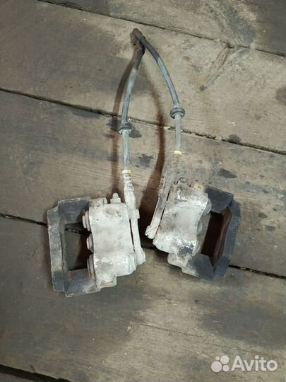 Супорт тормозной шевроле нива