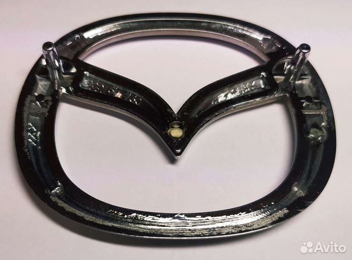 Эмблема Mazda Familia