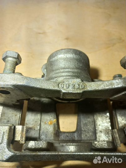 Суппорт тормозной левый Chevrolet Lachetti (J200)