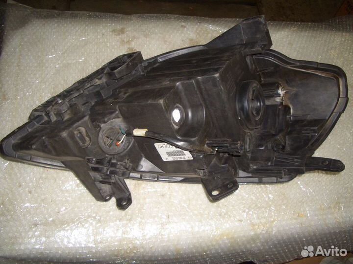 Фара левая Ниссан Тиида с07-14г