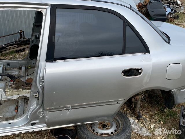 Задняя левая дверь Mitsubishi Carisma седан