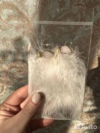 Серьги с перьями