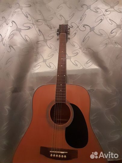 Акустическая гитара