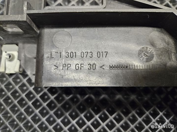 Кронштейн крепления фары Е46 левая