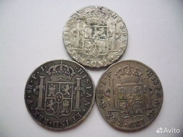 З монеты Испанские Колонии-8реалов.серебро