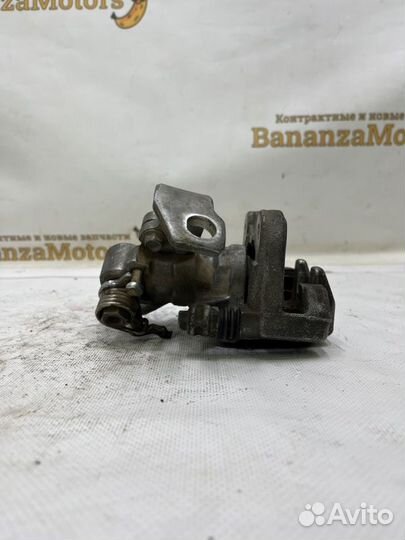 Суппорт тормозной задний левый Honda Civic 4D R18A
