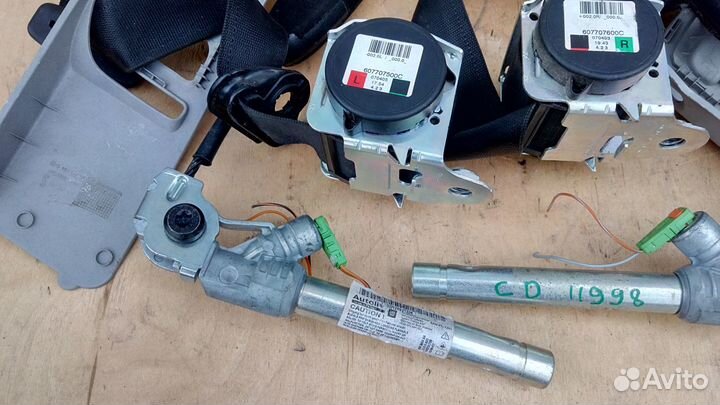 Преднатяжитель ремня передний на Опель Корса Д