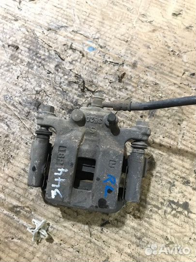 Суппорт задний левый Nissan X-Trail T31 QR25DE