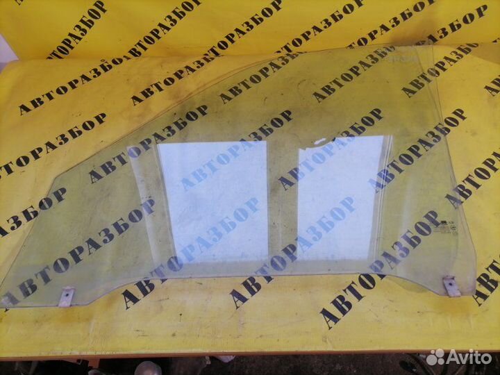 Стекло двери передней правой Kia Carnival 1