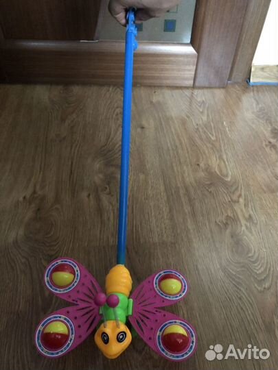 Игрушка каталка бабочка