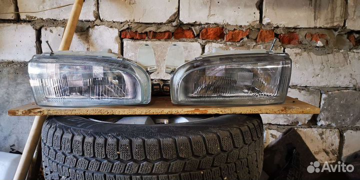 Фары corolla ae100
