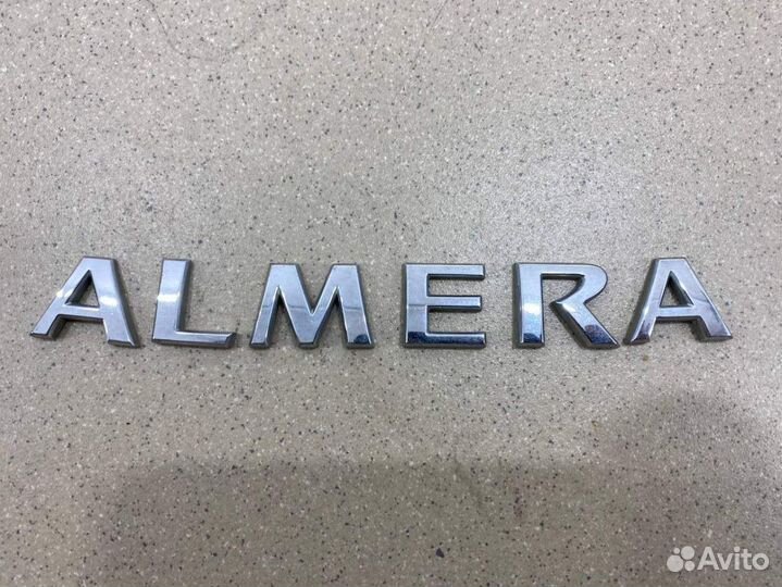Эмблема на крышку багажника Nissan Almera N16 2000
