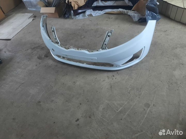 Передний бампер Kia Rio