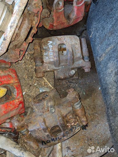 Суппорт задний передний mitsubishi lancer 9