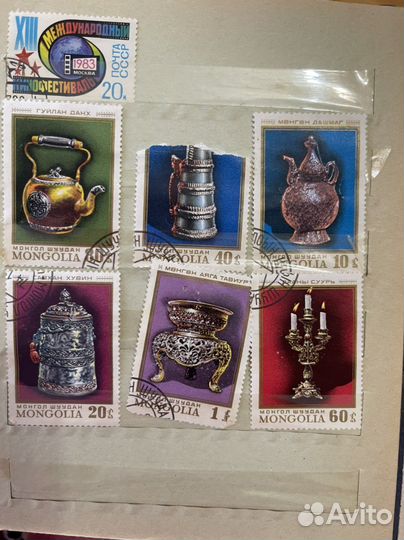 Марки почтовые разных стран в книге