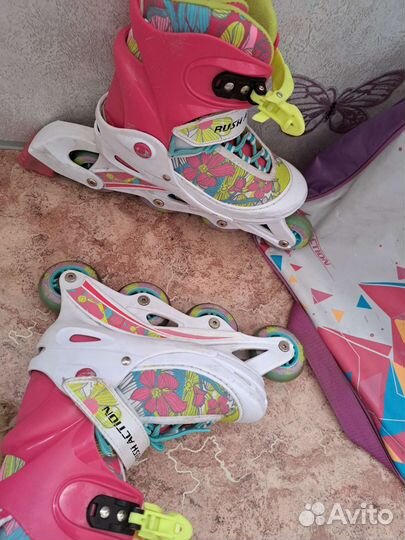 Роликовые коньки