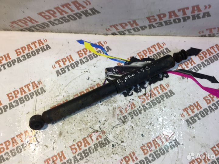 Мицубиси Паджеро Амортизатор задний