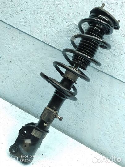 Передний правый амортизатор на Mazda Cx-5