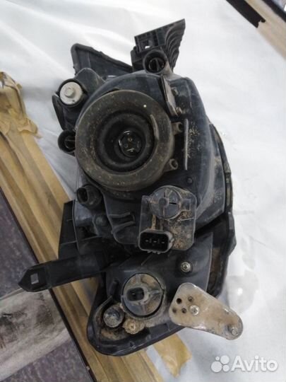 Фара передняя правая мицубиси л 200 4