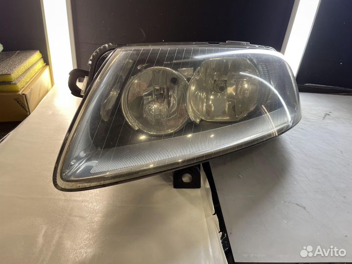 Фара левая Audi A6 4F0941003