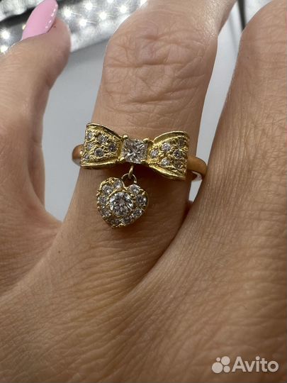 Золотое кольцо бант с бриллиантами 750 проба