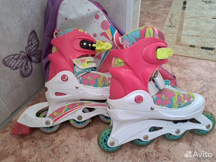 Роликовые коньки