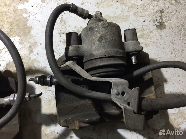 Суппорт передний оригинал VAG под 312mm