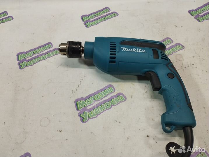 Ударная дрель Makita HP1640