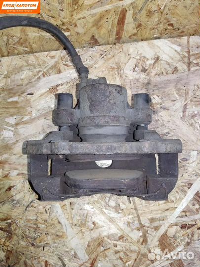 Суппорт тормозной передний левый Mazda 3 BL