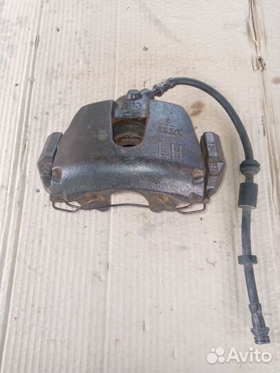 Суппорт передний левый Ford Focus 2