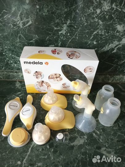Молокоотсос medela ручной
