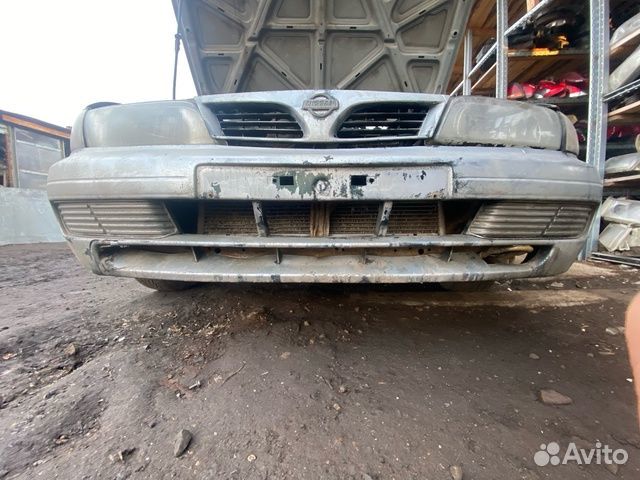 Передний бампер Nissan Almera N15