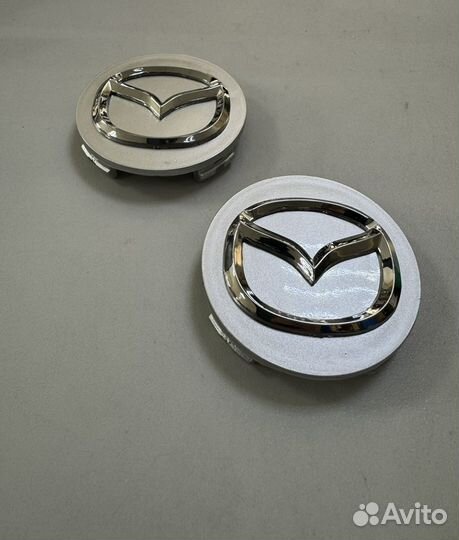 Колпачок ступицы литого диска Mazda BBM237190