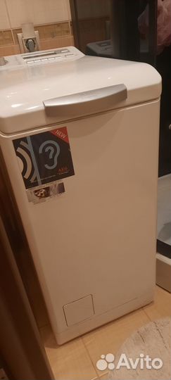 Стиральная машина с вертикальной загрузкой