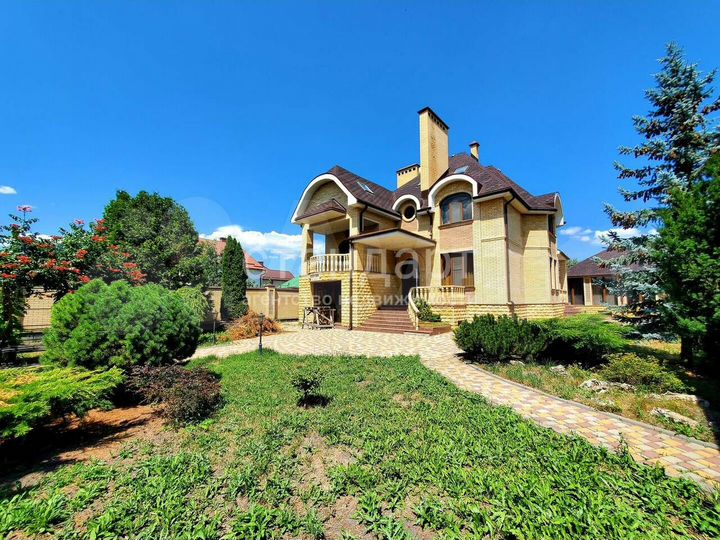 Дом 303 м² на участке 14 сот.