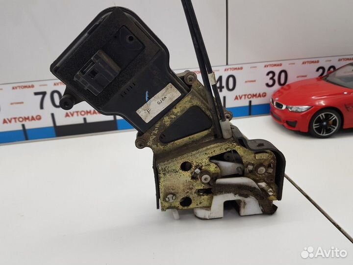 Замок двери задний правый (Mazda 6)