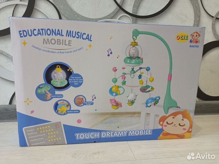 Детский мобиль в кроватку музыкальный