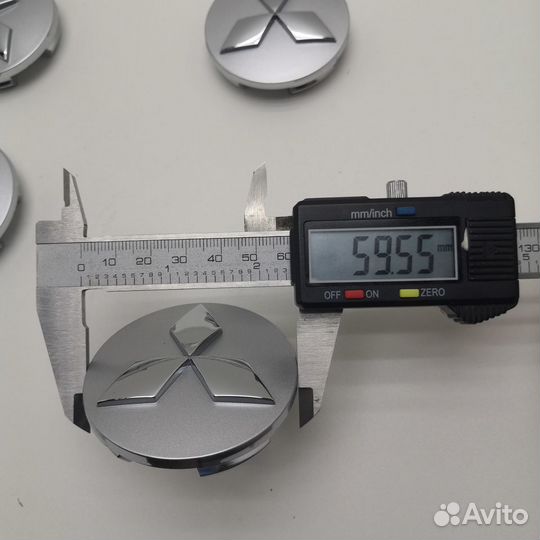 4шт Mitsubishi MR554097 комплект колпаков серебро