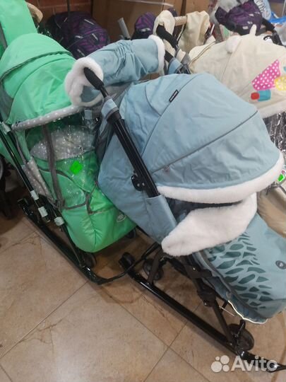 Санки коляска ника в наличии меховые с варежками