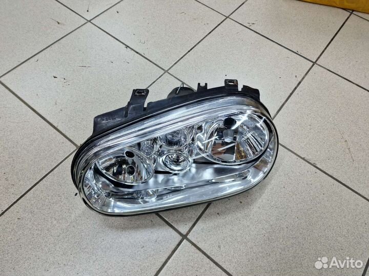 Фара передняя левая VW Golf 4 новая TYG