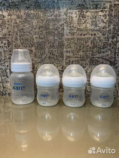 Бутылочки для кормления и молокоотсос