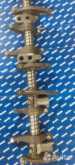 Коромысло с осью и стойками в сборе 650.1007088