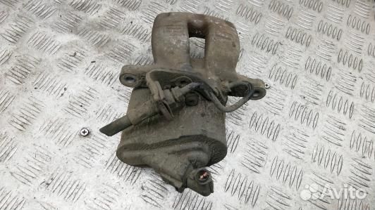 Суппорт тормозной задний левый volkswagen passat B