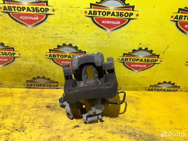 Суппорт тормозной задний левый Peugeot Partner II