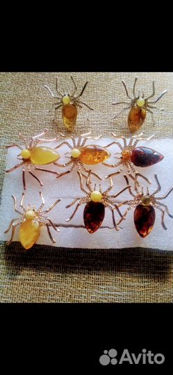 Кольца брошки янтарь